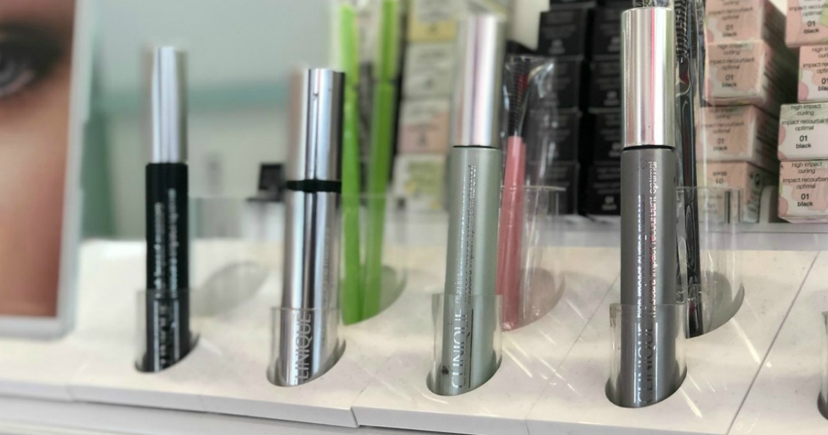 several tubes of mascara on store display