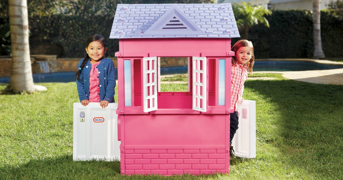 girls outside playhouse