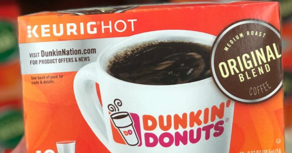 Hand holding dunkin donuts k-cups
