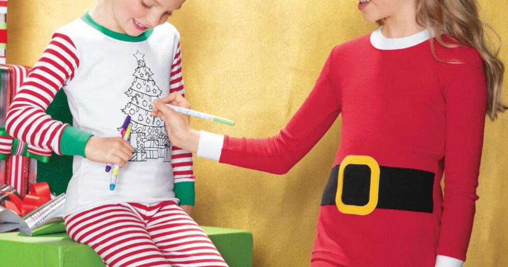 little girls wearing holiday pajamas
