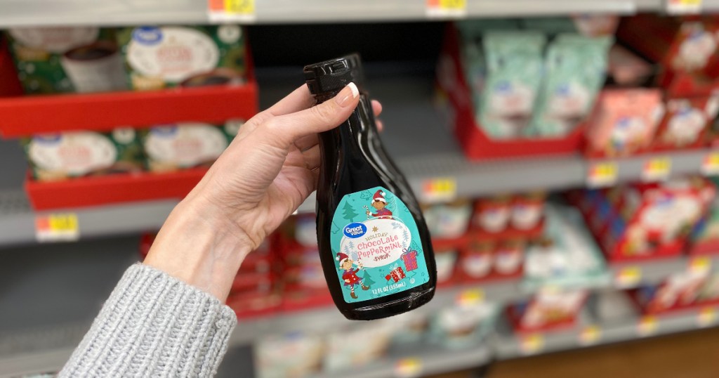 Woman holding bottle of Great Value Holiday Chocolate Peppermint Syrup