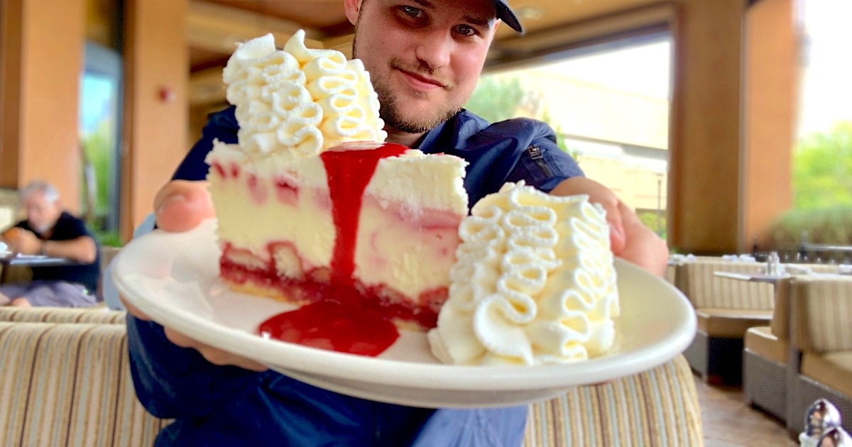 Black Friday ad release predictions - man holding piece of cheesecake