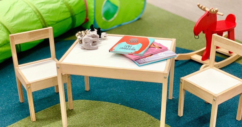 kids table and chairs with colorful books and toys