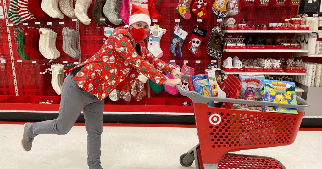 man pushing Target shopping cart in mask