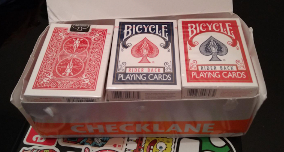 red and blue decks of playing cards in box