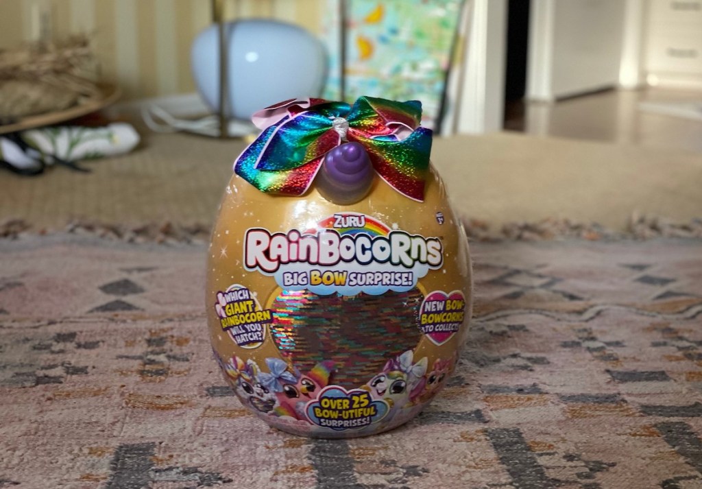 rainbocorns big bow giant surprise egg sitting on floor