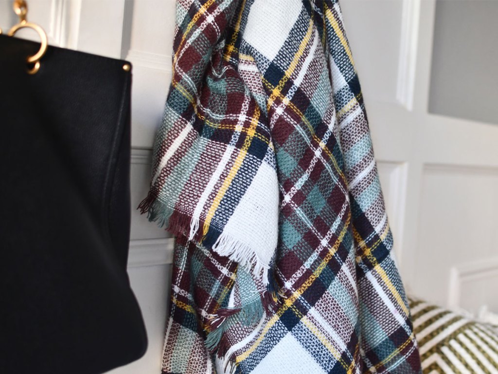 Cents of Style Berlin Plaid Scarf hanging on hook in house