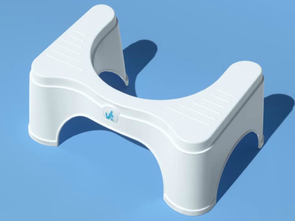 white plastic base to use at toilet