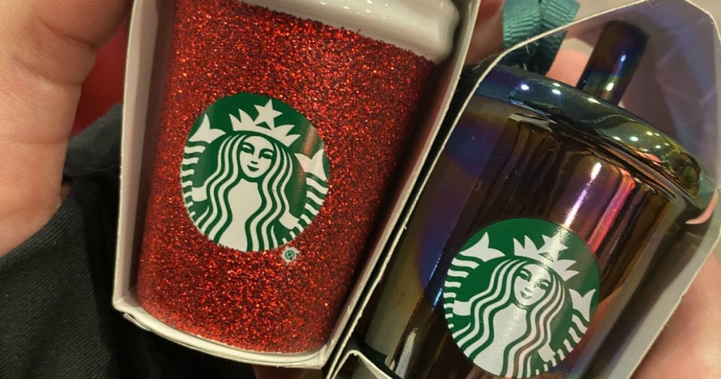 Starbucks cup Christmas ornaments held in hand