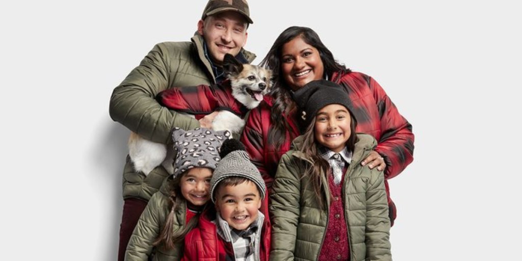 Family wearing matching puffer jackets