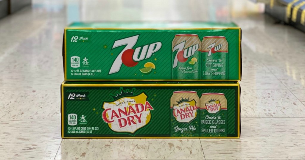 7up and canada dry 12-packs of soda on the floor in store