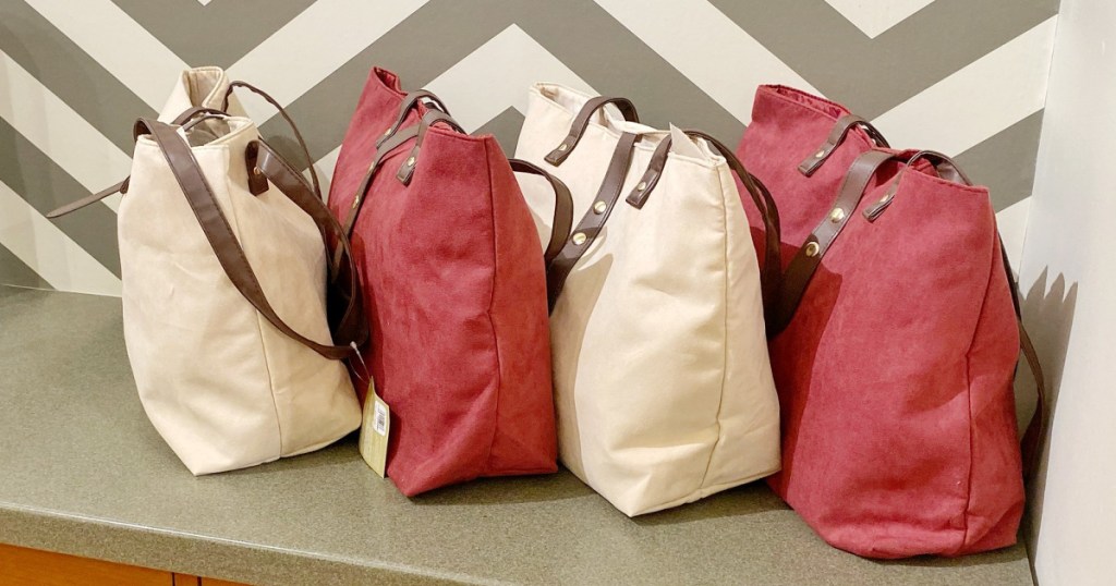 yankee candle fragrance lovers tote bags on counter in store