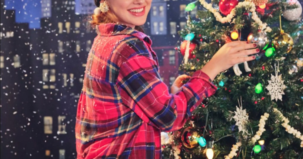 girl wearing AEO Flannel Shirt near Christmas tree