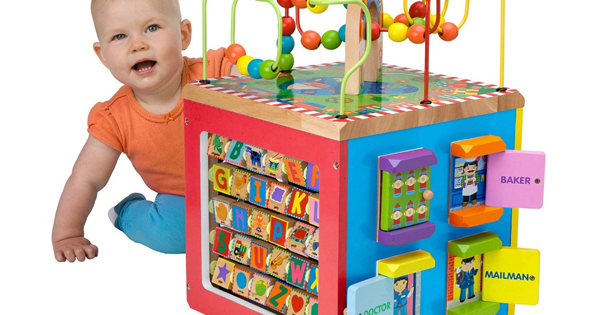 baby playing with activity cube