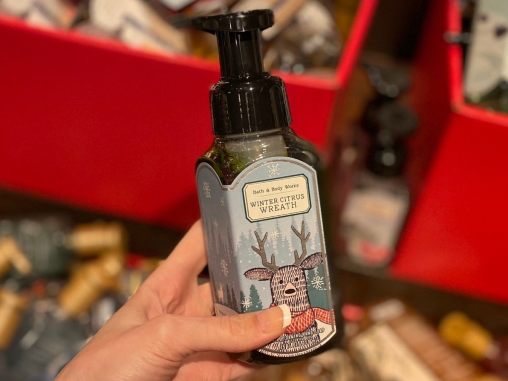Hand holding Winter Citrus Wreath Hand Soap at Bath & Body Works 