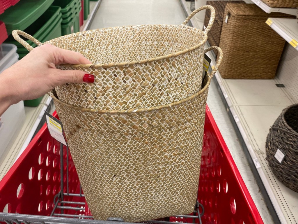 Hand holding Threshold Decorative Basket Color Washed in Target shopping cart 