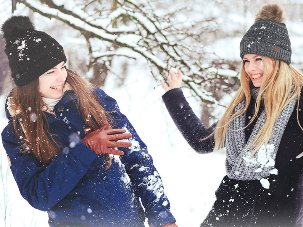 Girls wearing Brook & Bay beanies in the snow