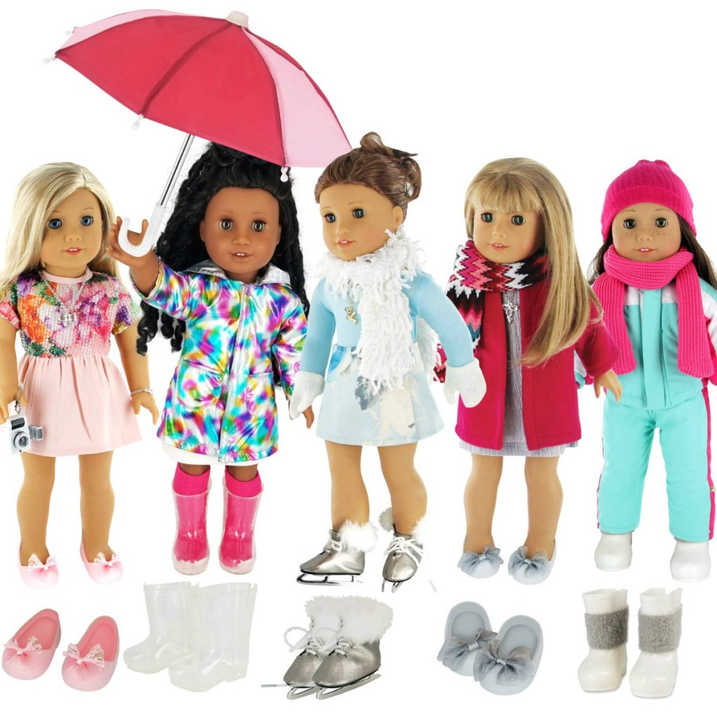Dolls wearing outfits with accessories