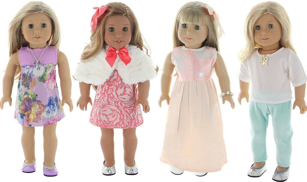 Dolls wearing four different doll outfits