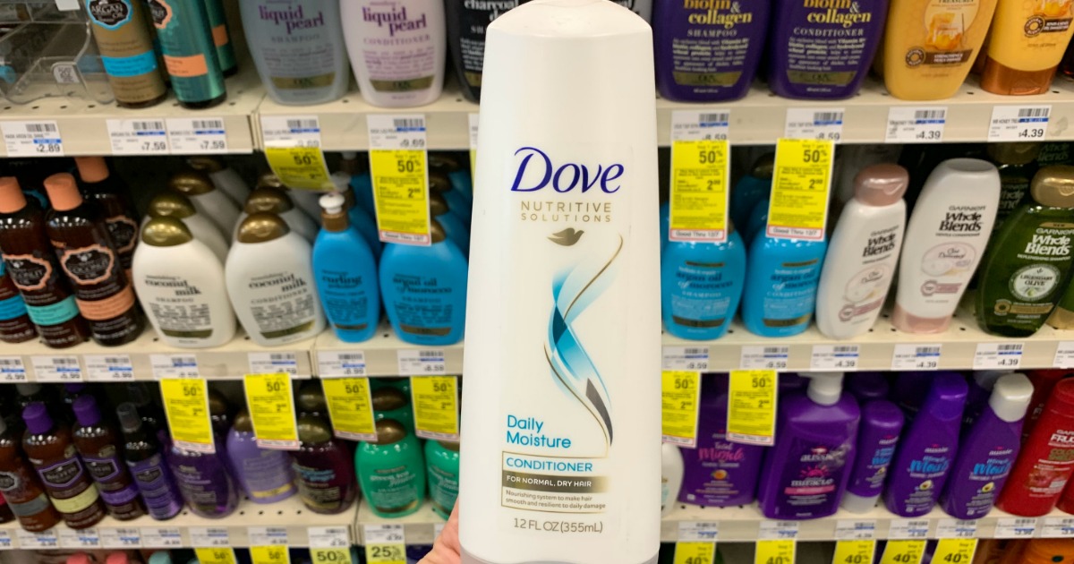 Dove shampoo in front of shelf 