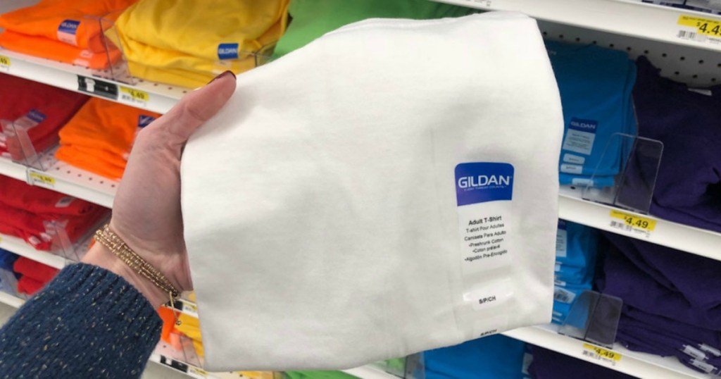 hand holding single gildan white t-shirt