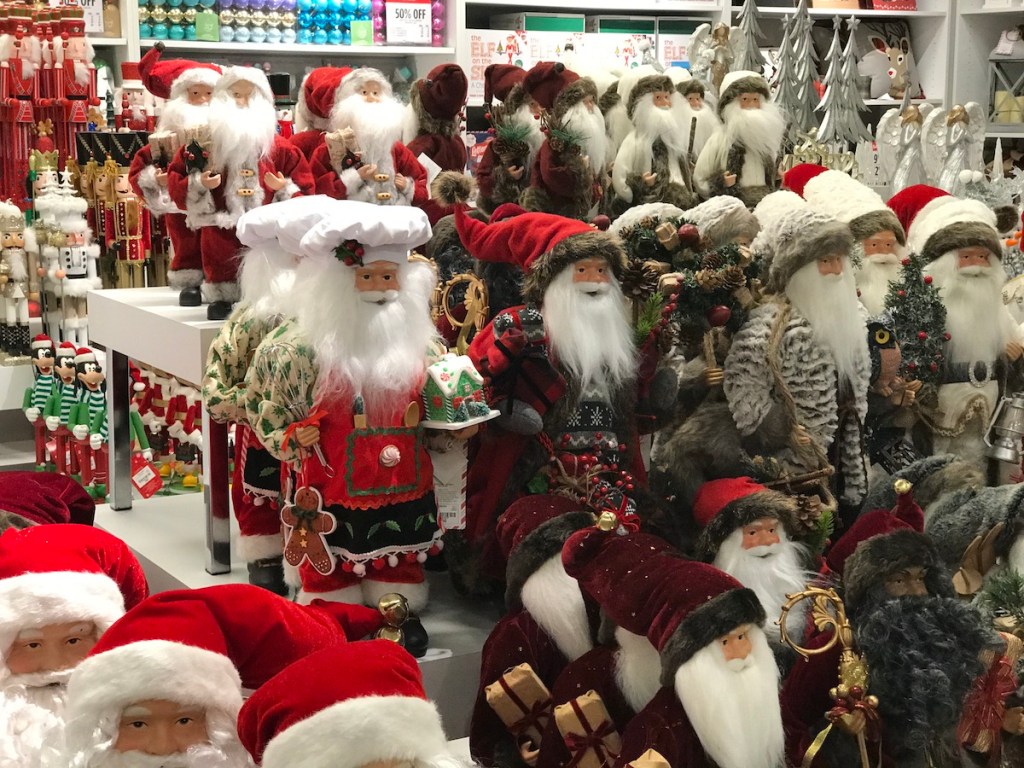 JCPenney North Pole Trading Co Santas on display