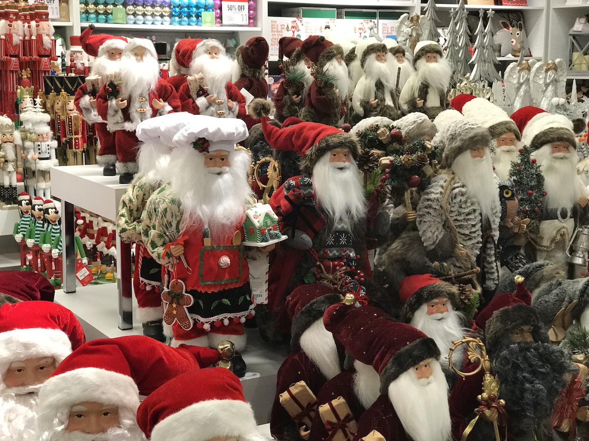 JCPenney North Pole Trading Co Santas on display