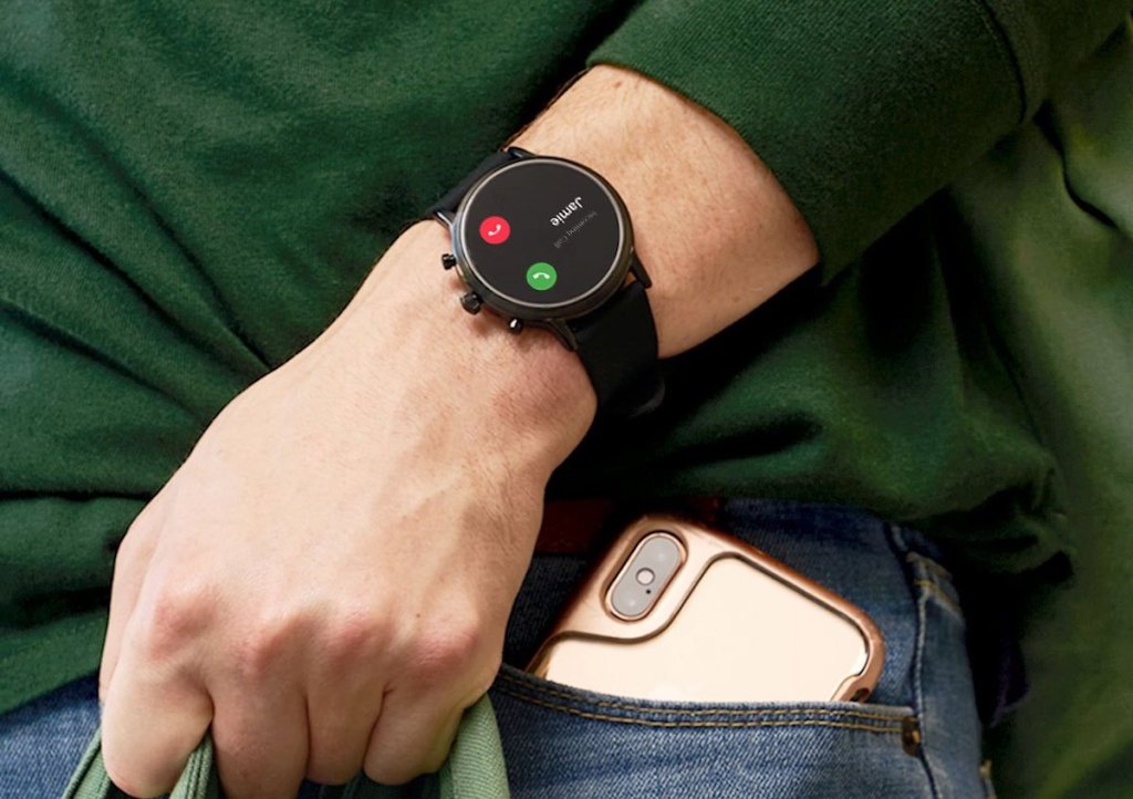 fossil Julianna HR Stainless Steel Gen 5 Smartwatch on watch with iphone in pocket