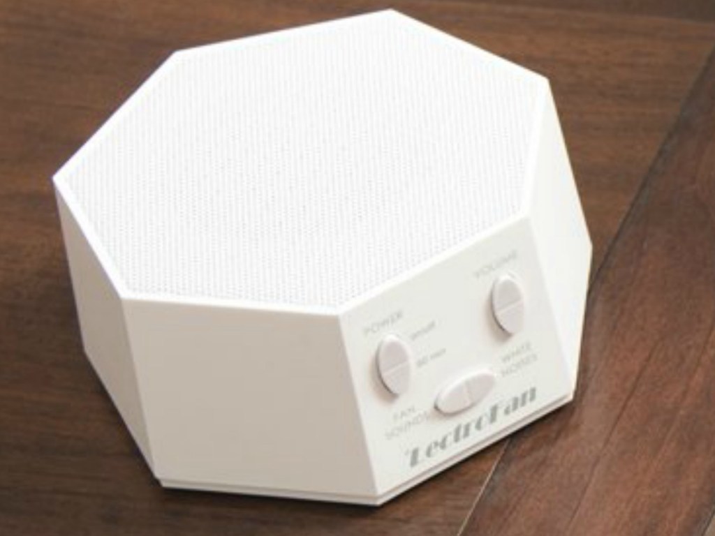 LectroFan brand white noise machine on end table