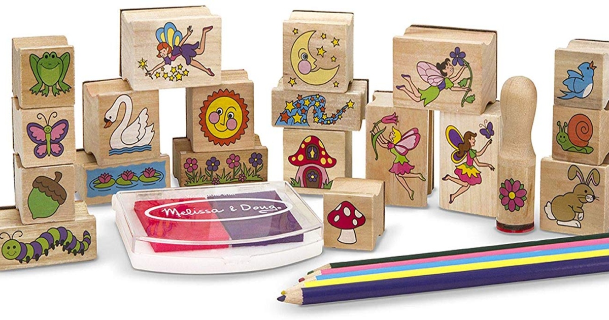 Melissa & Doug Wooden stamp set. All lined up with stamp pad and pencils