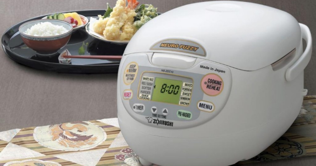 Zojirushi Neuro Fuzzy 10 Cup Rice Cooker and Warmer next to a plate of food