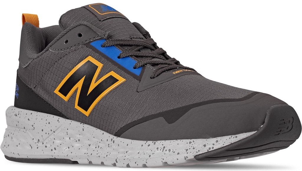 grey, blue, and orange new balance sneakers