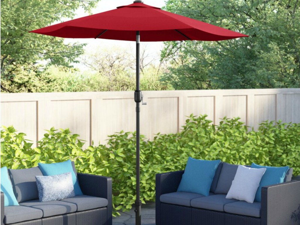 red outdoor umbrella and patio set