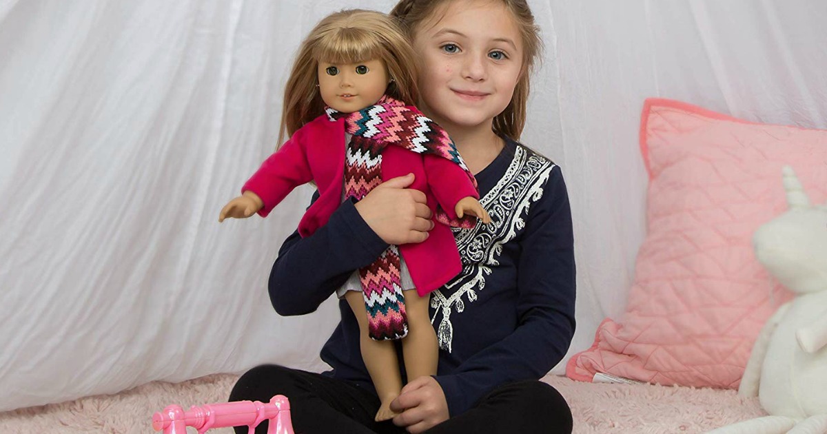 girl holding PZAS doll from Amazon