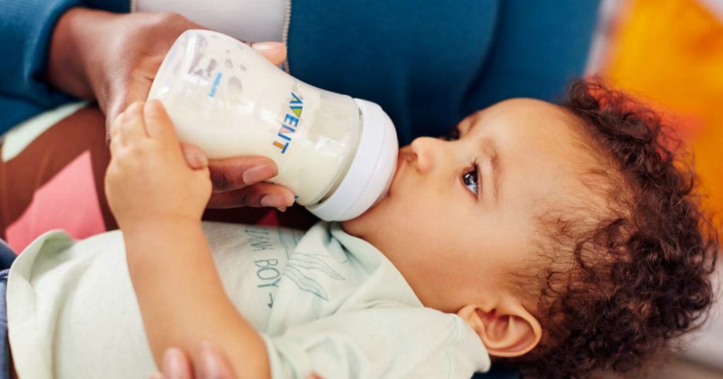 woman feeding a baby using a Philips Avent Baby Bottle