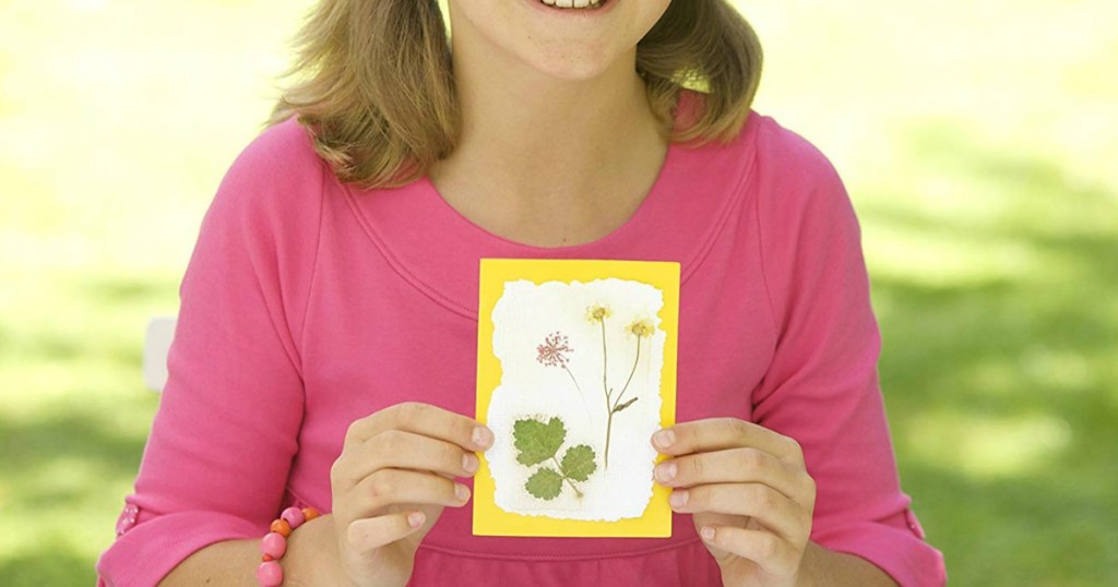 girl holding Pressed Flower Kit