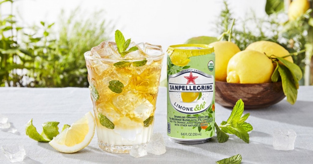 Sanpellegrino Limone Sparkling Organic Juice and Tea next to a glass of ice and fruit