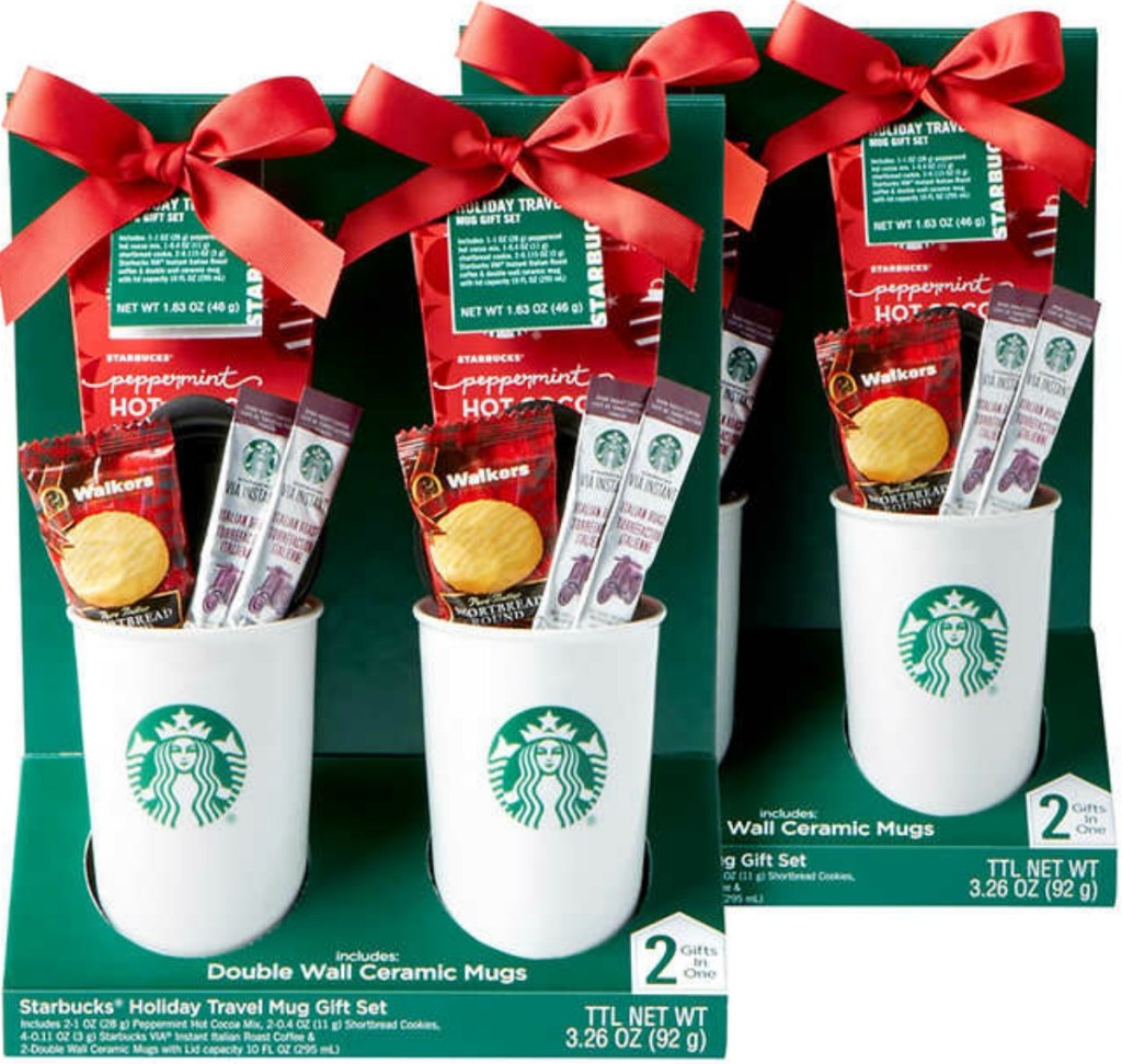 Two Starbucks gift sets with travel mugs in package