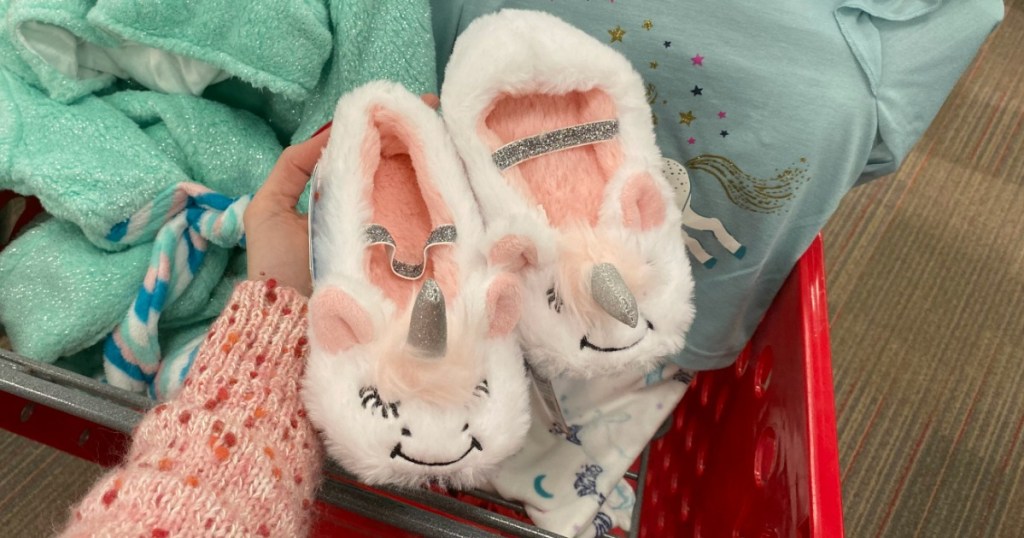 Target fuzzy unicorn slippers near red Target shopping cart
