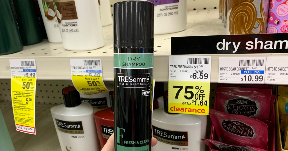 Tresemme dry shampoo in front of shelf 