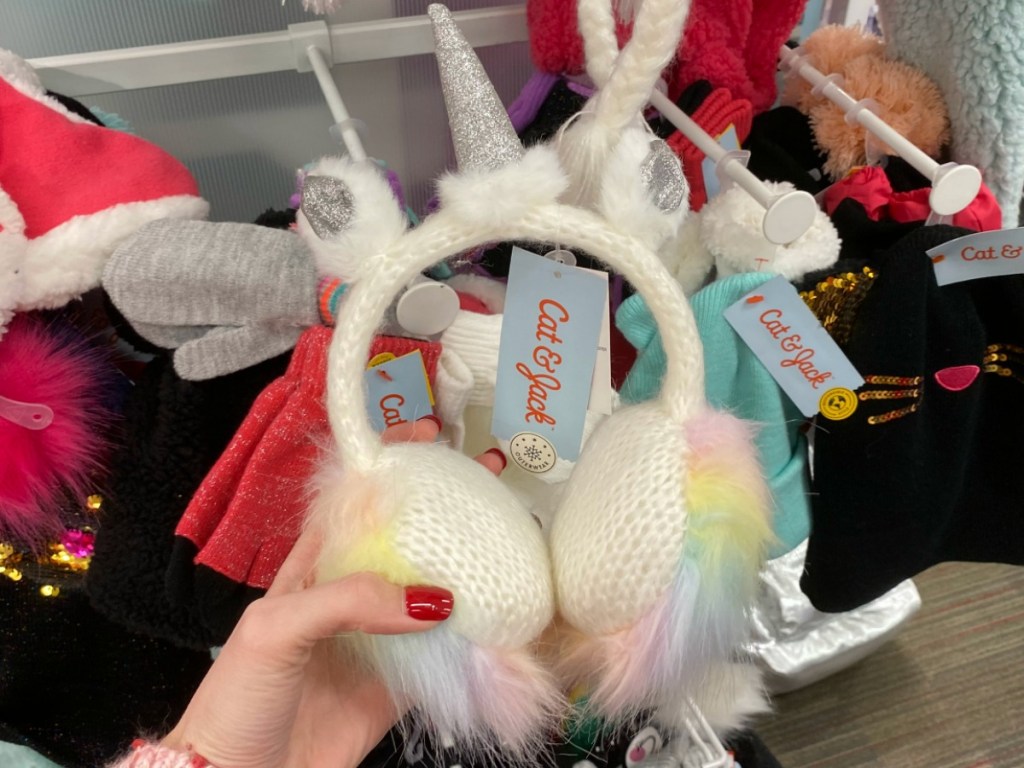 Unicorn-themed ear muffs from Target near in-store display