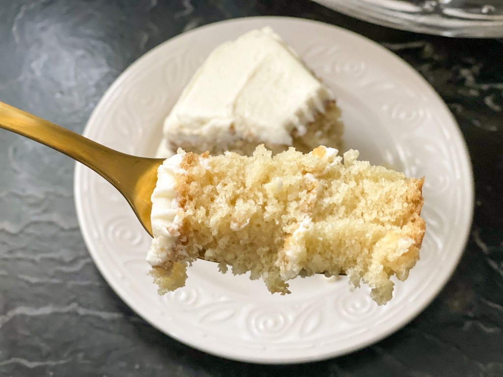 bite of vanilla crazy cake on a fork