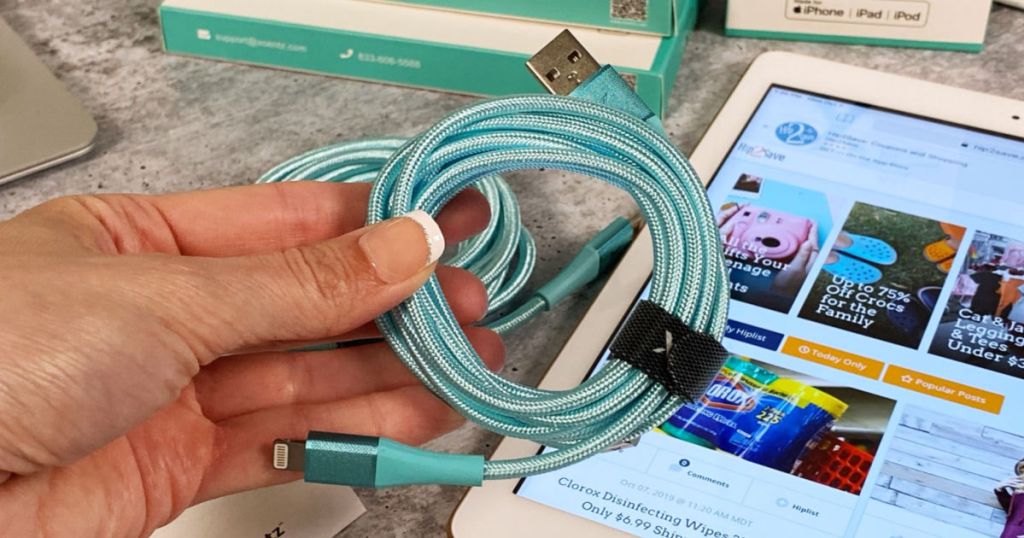 Xcentz Charger Cord Blue in woman hand with ipad behind it