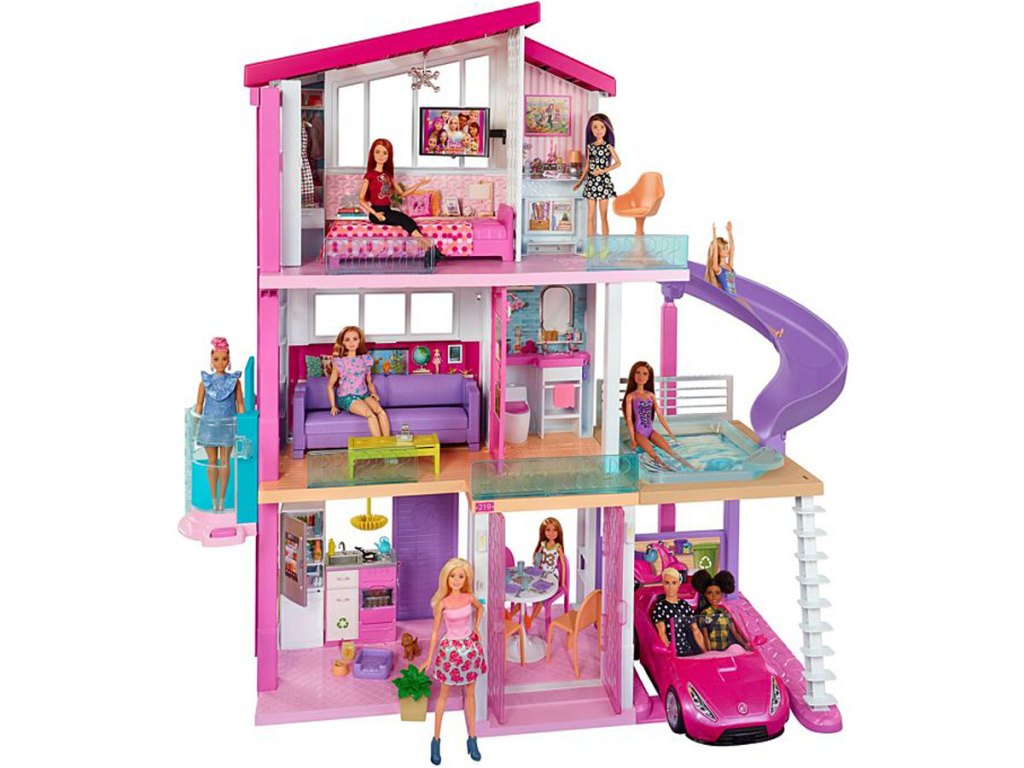barbie dream house with barbies and car in it