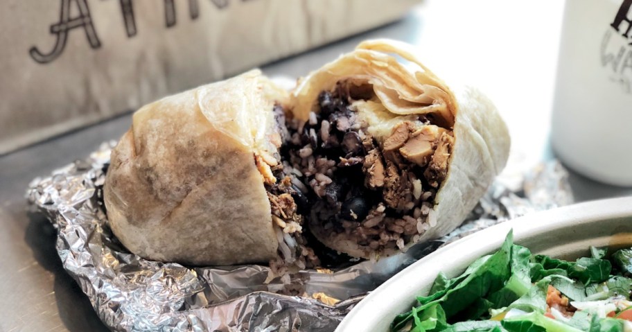 picture of cut open Chipotle burrito iwth black beans, chicken, cheese, and more