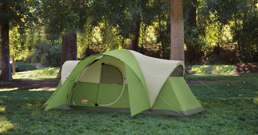 green coleman tent outside