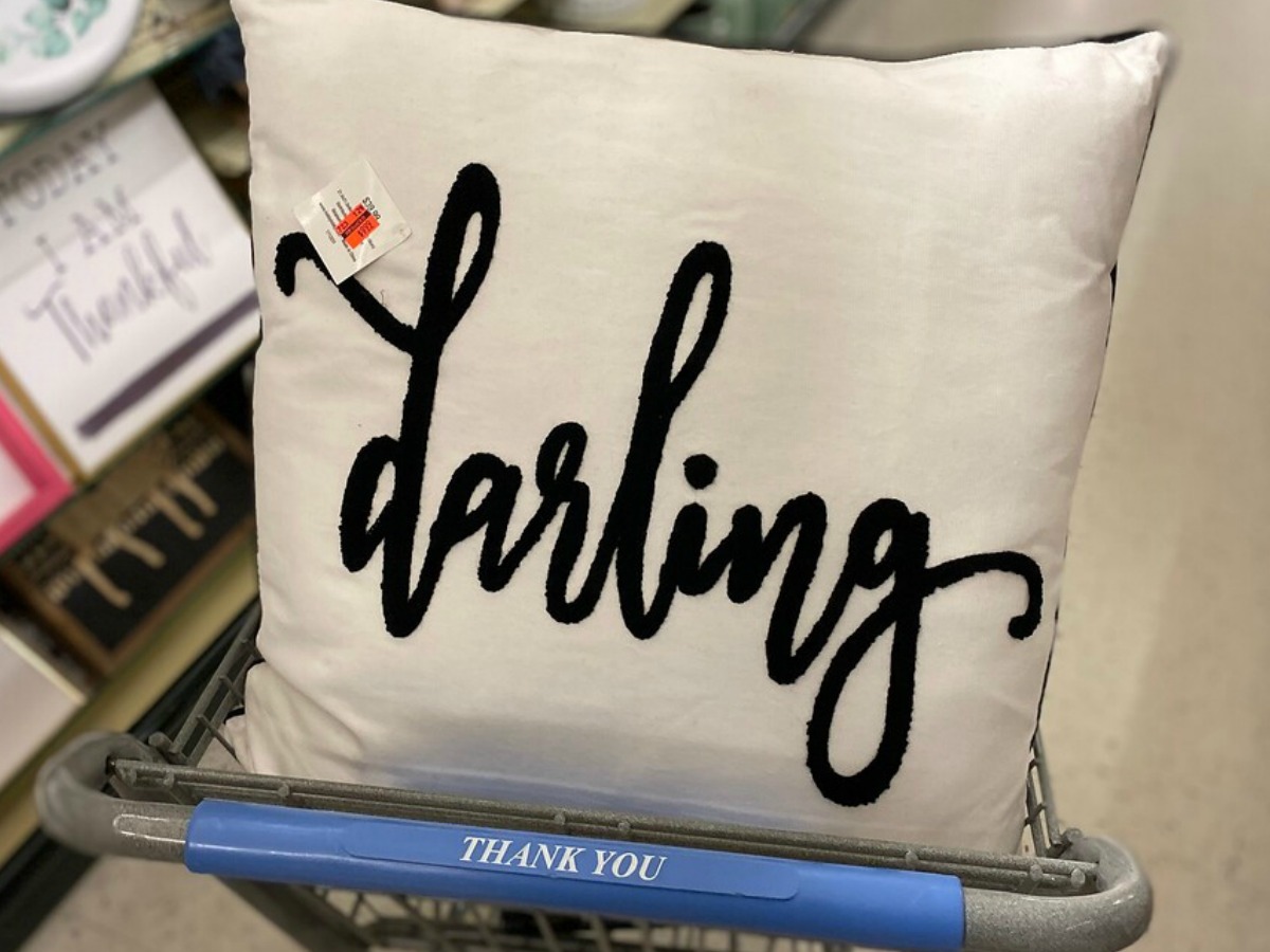 pillow in store cart that says darling on it