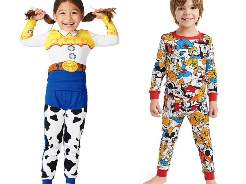 a boy and a girl wearing Disney pajamas