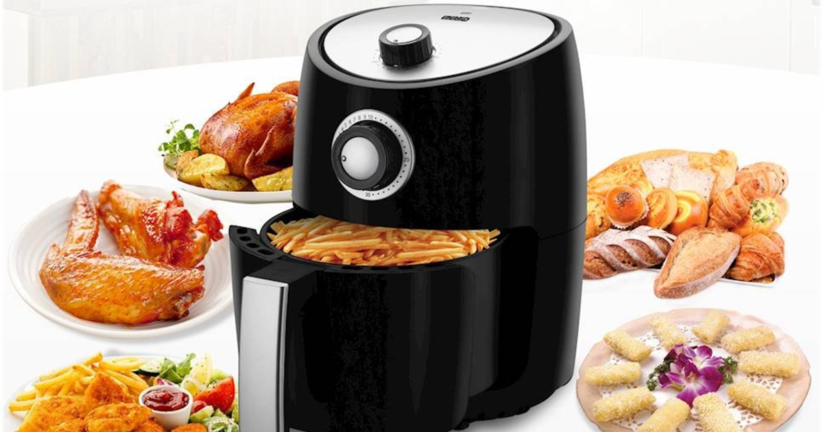 black analog air fryer with fried foods surrounding it