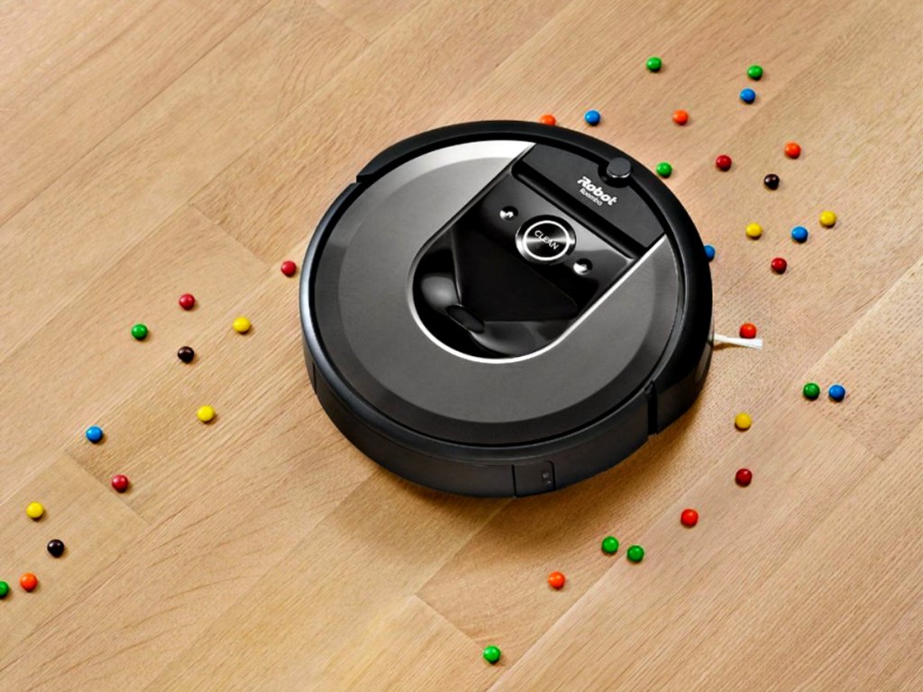 iRobot Roomba i7 Wi-Fi Connected Robot Vacuum with candy on floor